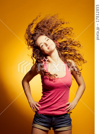 Sexy happy woman dancing excited yellow background Sexy happy woman dancing excited yellow background 17812855
