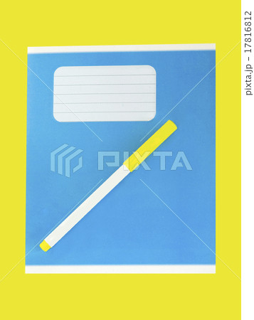 Blue writing book on a yellow background. Blue writing book on a yellow background. 17816812