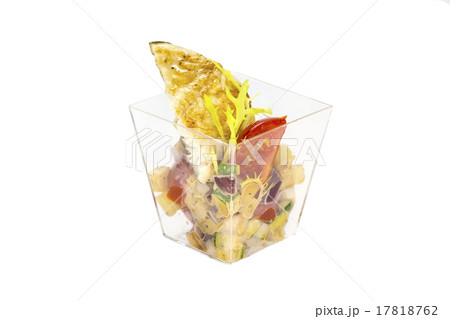 mini canape with meat and vegetables on a white ba 17818762