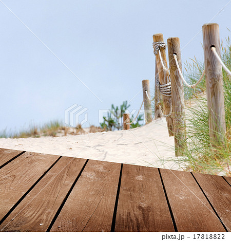 Beach and empty wooden deck table. Beach and empty wooden deck table. 17818822