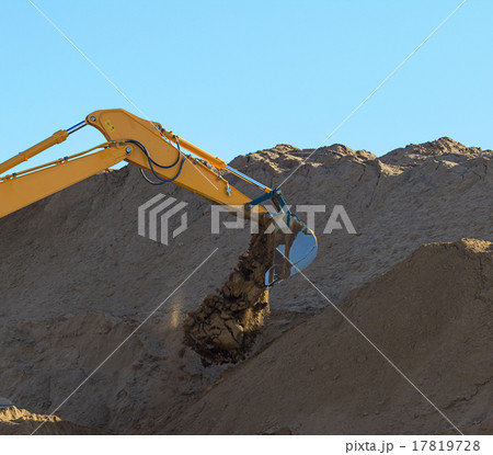 Yellow Excavator at Work Yellow Excavator at Work 17819728