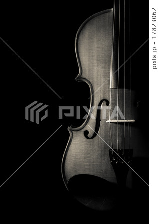 Closeup Violin orchestra musical instruments on black background 17823062