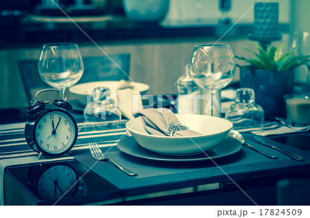 restaurant set with vintage clock at lunch time at Luxury Interi restaurant set with vintage clock at lunch time at Luxury Interi 17824509