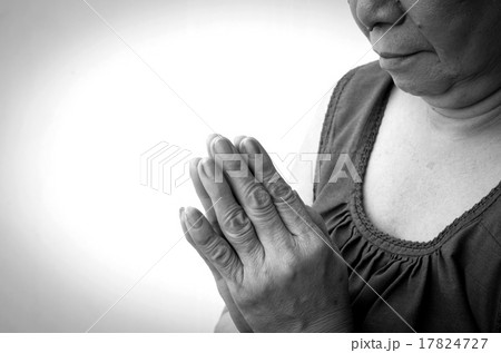 Old woman praying Old woman praying 17824727