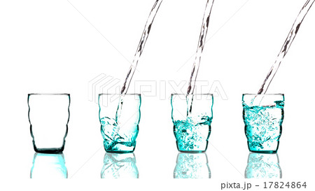 Stack of Pouring water into glass on white background 17824864