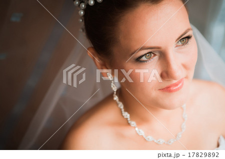 Happy Bride looking in window 17829892
