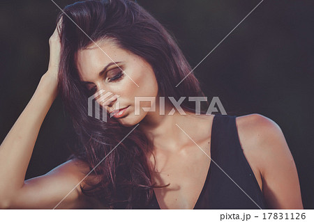 brunette girl in black dress brunette girl in black dress 17831126