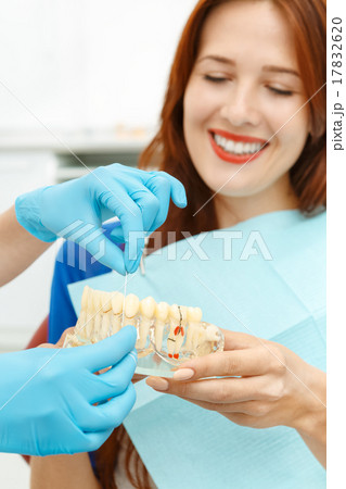 Dentist advising the customer 17832620