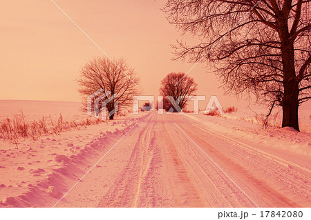 Snowy road at sunrise 17842080