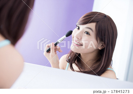 Smile woman with makeup brushes 17845273