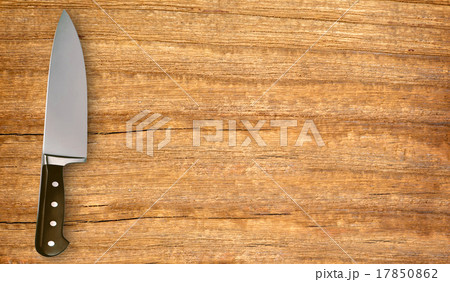 knife on cutting board isolated on white 17850862