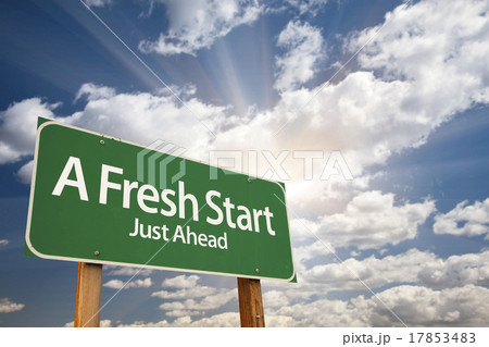 A Fresh Start Green Road Sign Over Clouds 17853483