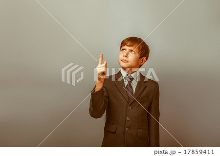 a boy of twelve European appearance in a suit a boy of twelve European appearance in a suit 17859411