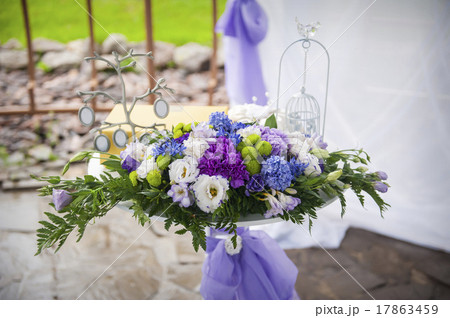 compositions of flowers at the wedding 17863459
