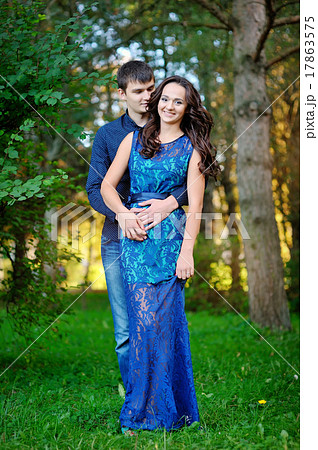 Young happy smiling attractive couple together outdoors 17863575