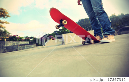 skateboarder legs at skatepark 17867312