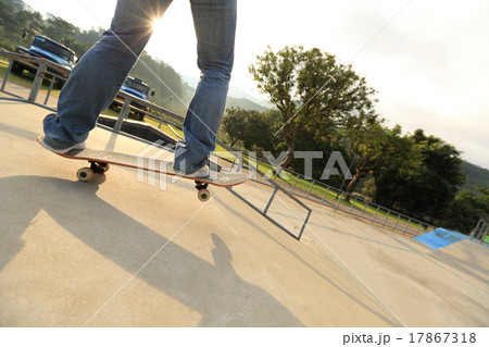 skateboarder legs skateboarding at skatepark ramp 17867318