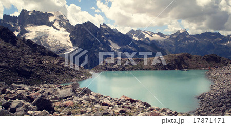 View of Distant Peaks. Blue water. Alpine lake. View of Distant Peaks. Blue water. Alpine lake. 17871471