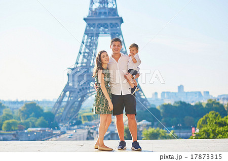 Happy family of three enjoying their vacation in Paris 17873315