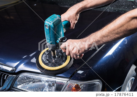 Car polishing series : A man waxing blue car 17876411
