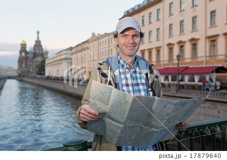 Tourist with a map in St. Petersburg, Russia Tourist with a map in St. Petersburg, Russia 17879640