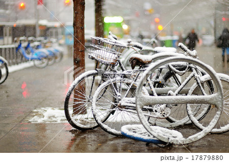 Snow covered bicycles in New York Snow covered bicycles in New York 17879880