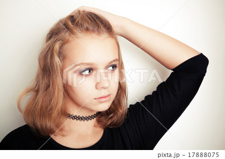 Blond teenage girl in black tattoo choker 17888075