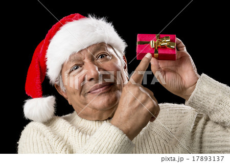 Male Senior With Red Pompom Hat And Christmas Gift 17893137