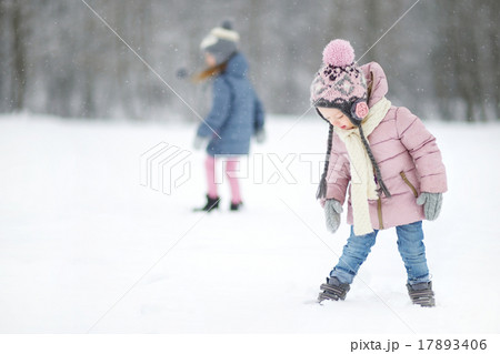 Two funny adorable little sisters winter park Two funny adorable little sisters winter park 17893406