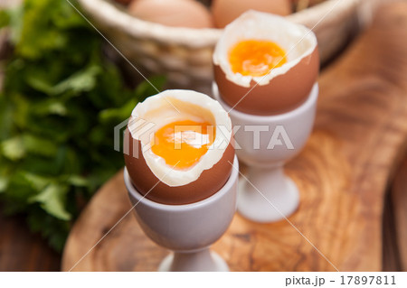 Boiled eggs on a wooden background Boiled eggs on a wooden background 17897811