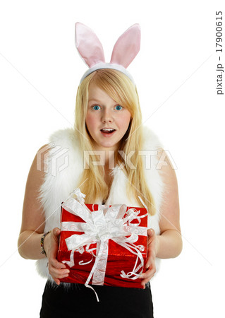 Happy smiling girl with a gift - rabbit Happy smiling girl with a gift - rabbit 17900615