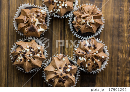 Chocolate cupcakes on a table Chocolate cupcakes on a table 17901292