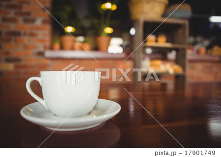 Cup and saucer on the counter Cup and saucer on the counter 17901749