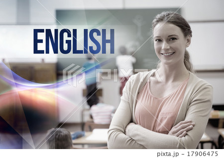 English against pretty teacher smiling at camera at back of clas 17906475