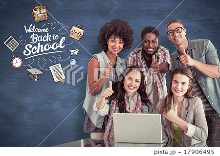 Composite image of fashion students working as a team Composite image of fashion students working as a team 17906495