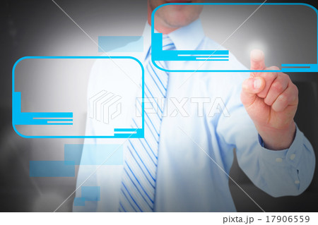 Composite image of businessman in shirt pointing with his finger Composite image of businessman in shirt pointing with his finger 17906559