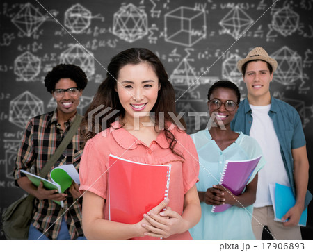Composite image of stylish students smiling at camera together 17906893