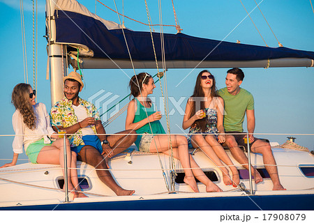 Cheerful young people relaxing on a yacht. 17908079