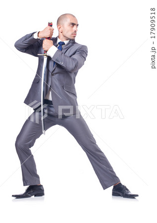 Businessman with sword isolated on white Businessman with sword isolated on white 17909518