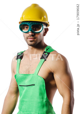 Man in green coveralls with goggles 17909682