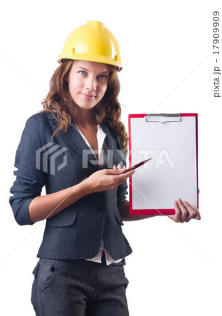 Woman with hard hat and binder Woman with hard hat and binder 17909909