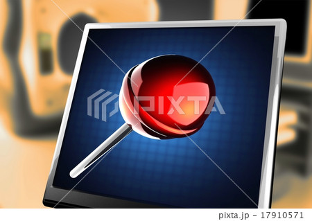Red lollipop on blue background at monitor 17910571