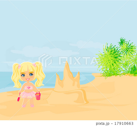 little girl building a sand castle at the beach 17910663