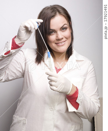 young pretty brunette woman doctor taking analyzes 17921491