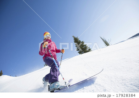 Woman skiing downhill Woman skiing downhill 17928384