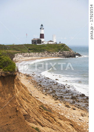 Lighthouse on cliff over sea Lighthouse on cliff over sea 17928554