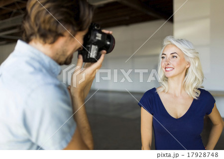 Man photographing woman 17928748
