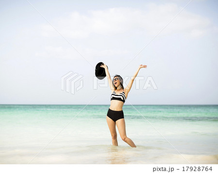 Happy woman on beach 17928764
