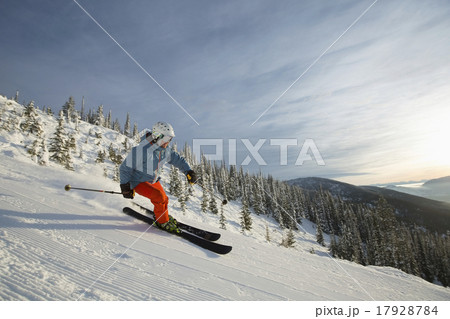 Mature man on ski slope at sunset Mature man on ski slope at sunset 17928784