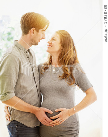 Mid-adult couple face to face outdoors 17928789